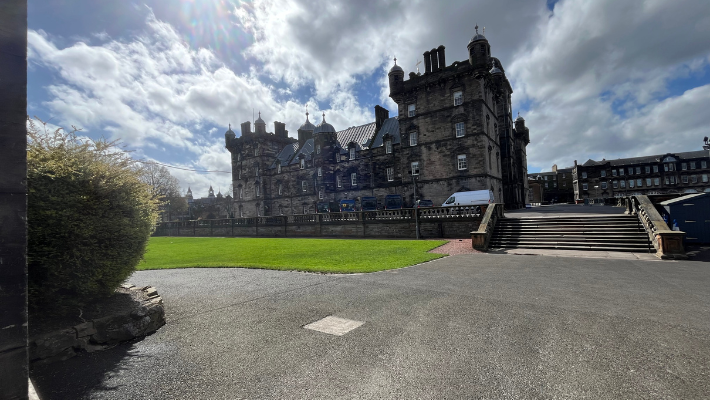 A photo of George Heriots School. The inspiration for Hogwarts. The sky is blue.