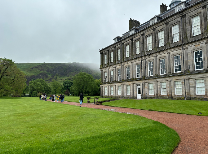 A red path sweeps round in front of Holyrood Palace.
